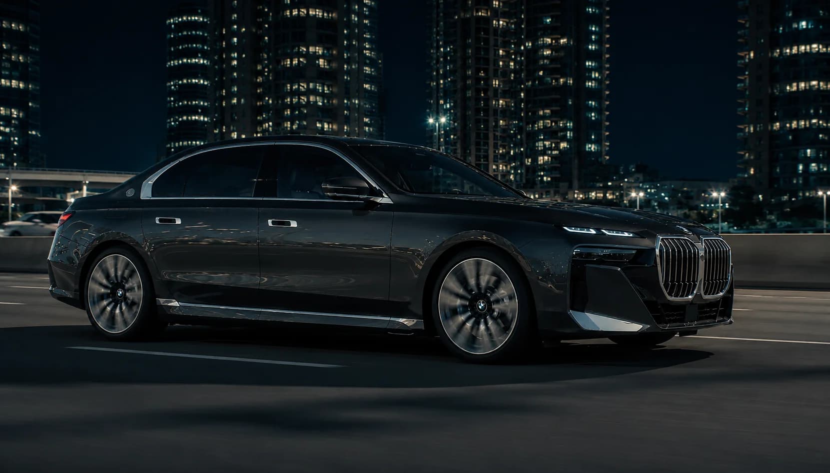 A vAI Rides flagship sedan at night across the Dubai skyline